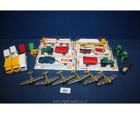 A quantity of Majorette vehicles including tractors and trailers, Shell lorry, car and boat, six small planes and small trans