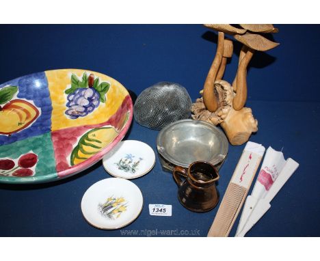 A box of china including two Worcester pin dishes, small Prinknash jug, two fans and Manco plate, metal teapot stand.