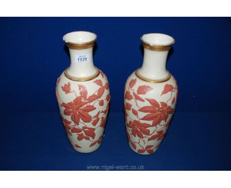 A pair of  Locke &amp; Co. Worcester blush ivory Vases with overall raised orange clematis flowers decoration with gold outli