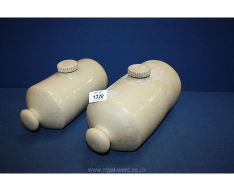 Two ceramic hot water bottles, one two pint and the other three pint.