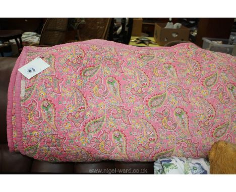 A vintage Paisley pink, yellow and green Throw.