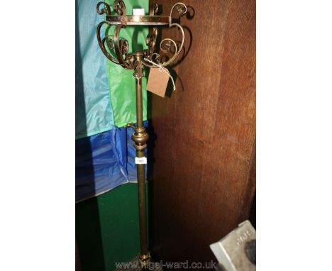 An adjustable Copper/brass standard Lamp.