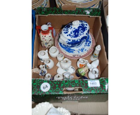 A quantity of souvenir china including Arcadia, lighthouse, bird, ashtray, Brighton, Lowestoft etc, Carltonware crinoline lad