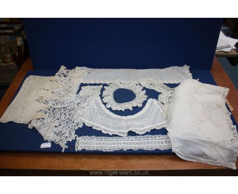 A quantity of Vintage handmade lace dress items, cuffs, modesties and blouse (ten items).