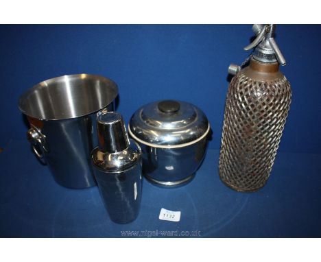 A 1950's thermos ice bucket, cocktail maker, ice bucket plus a wired cased sofa siphon.