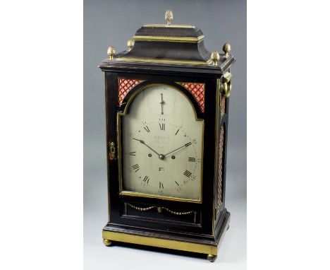 A George III ebonised and gilt brass mounted mantel clock by Grant of Fleet Street of London, No. 350, the 8ins arched silver
