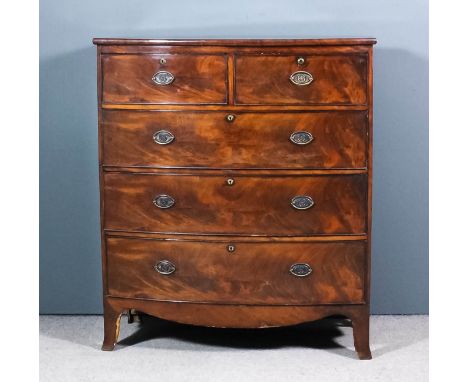 A late Georgian mahogany bow front chest with curved edge to top fitted two short and three long drawers on shaped apron and 