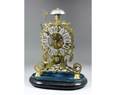 A 19th Century brass framed skeleton clock, the 6ins diameter fretted silvered chapter ring of shaped outline, to the eight d