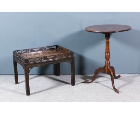 A George III mahogany oval tripod table, on turned central column and cabriole legs, 22ins x 21.5ins x 28ins high, and a maho