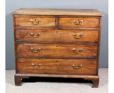 A George III mahogany chest with moulded edge to top, fitted two short and three long drawers, on bracket feet, 44ins wide x 