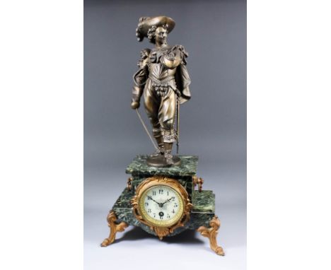 A late 19th Century French gilt spelter and green veined marble cased mantel timepiece, No. 53786, the 3ins diameter white en