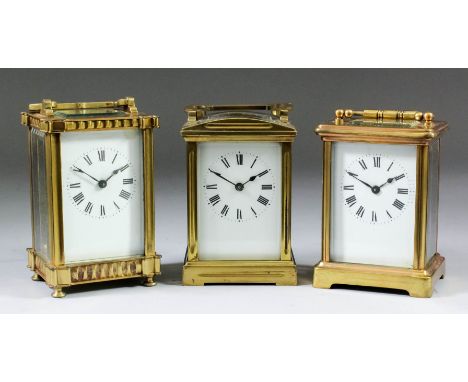 An early 20th Century French carriage timepiece, the white enamel dial with Roman numerals, to the eight day single train mov