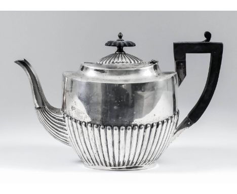 A George V silver oval teapot with part reeded body, ebonised finial and angular loop handle, 7.25ins high, by Walker & Hall,