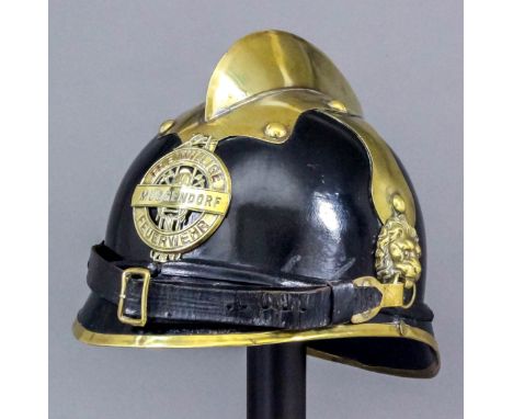 A late 19th/early 20th Century Austrian Voluntary Fireman's dress parade helmet of steel, leather and brass from the municipa