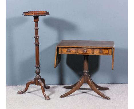 A mahogany octagonal tray top torchere of "Georgian" design, retailed by Tozer, 35 Brook Street, London, with shaped gallery 