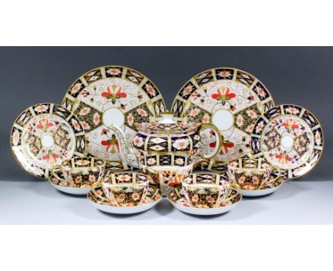 A Royal Crown Derby bone china tea service decorated in coloured enamels and gilt with an "Imari" pattern (Pattern No. 2451),