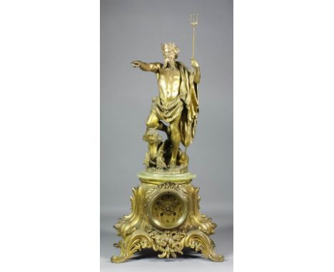 A late 19th Century French gilt metal cased mantel clock, No. 3700, the 3.5ins diameter dial with circular numeral cartouche 