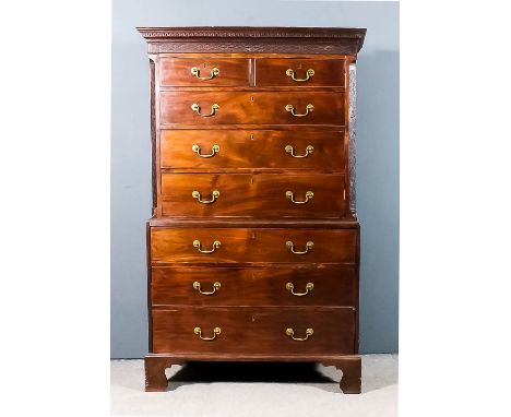 A George III mahogany tallboy, the upper part with moulded cornice, with Greek key pattern ornament, blind fret carved frieze