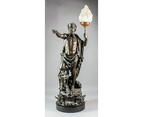 A late 19th Century French bronzed spelter electric table lamp modeled with the standing figure of Neptune, 38.5ins high