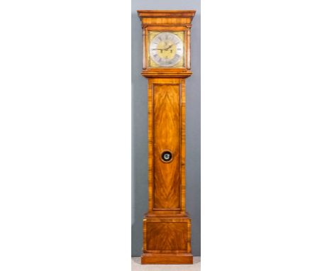 An 18th Century walnut longcase clock by John Richards of Honiton, the 12ins square brass dial with silvered chapter ring wit