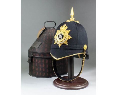 A dress helmet of the First Battalion the Suffolk Regiment, the former property of the late Brigadier H.J. Gardham, in fitted