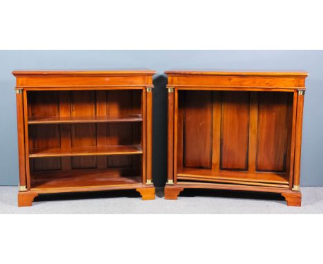 A pair of modern mahogany open front dwarf bookcases with moulded edge to top and plain frieze, each fitted two adjustable sh