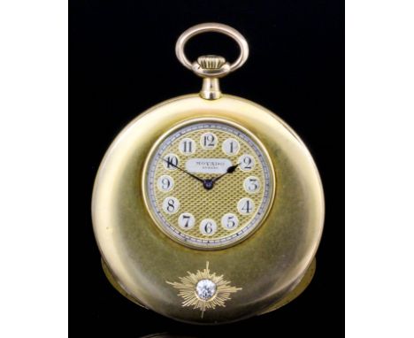 An early 20th Century Swiss gentleman's 14k gold open faced keyless dress watch by Movana, No. 34976, the gilt engine turned 