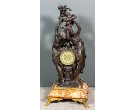 A 19th Century French bronzed spelter mantel clock by A.D. Mougin, No. 133, the 4.5ins diameter brass dial with circular nume