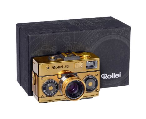 Goldenes Jubiläumsmodell Rollei 35 Classic "75 YEARS", um 1995Rollei, Germany. Sondermodell mit Echt-Gold-Plakette und Brilla