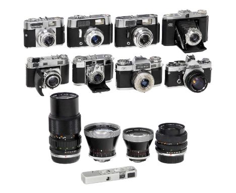 Lot Kleinbild- und Rollfilmkameras1) Olympus OM-1 mit Zuiko 1,4/50 mm. (3/3) - 2) Olympus Zuiko 3,5-4,5/35-70 mm. (2/2) - 3) 