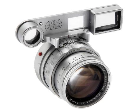 Leica M Nah-Summicron 2/5 cm, um 1957Leitz, Wetzlar. Nr. 1512340. Bei Punktlicht innen schwacher Belag bemerkbar, sonst sehr 