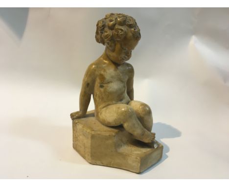 A Modern British plaster sculpture by Phoebe Stapler (1879-1955) in the form of a young boy seated on step impressed marks ar