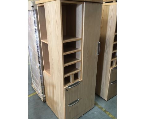 A Quality Knoll compact office cabinet with a coat hanging section small open storage shelfs and drawers. (Option on five exa