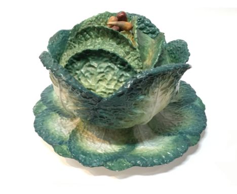 A ceramic cabbage dish and cover.