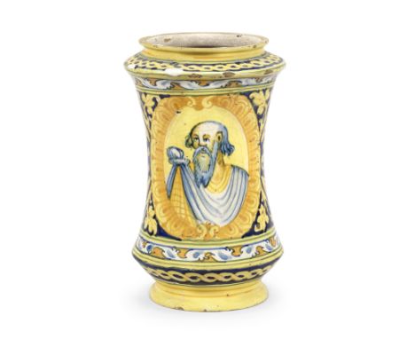 A Faenza maiolica albarello, circa 1540-70Decorated with an oval portrait of a bearded man in yellow and ochre border, agains