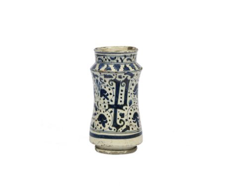 A Spanish Albarello, Valencia (Paterna or Manises),1400-1450Decorated in blue on impure white tin-glazed ground with a triple