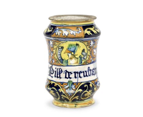 A Faenza maiolica Albarello, early 16th centuryDecorated with alternating panels with foliate scrollwork, set with a profile 
