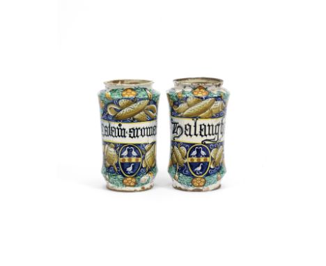 A pair of armorial albarelli, probably Le Marche, dated 1580Each decorated with a drug label in Gothic script reading 'FALANG