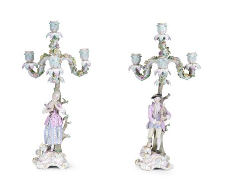 A pair of Meissen large figural candelabra, late 19th centuryModelled by Ernst August Leuteritz after J.J. Kaendler, depcting