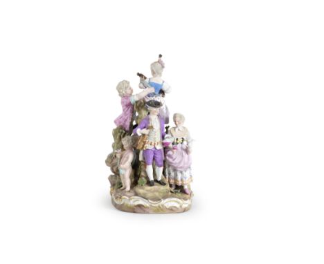 A large Meissen musical group, late 19th centuryAfter the 18th century model by M.V. Acier, modelled in the round with variou