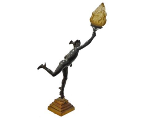 After Giambologna. Mercury, as a table lamp holding a red flamed shade, on a stepped base, 94cm high.