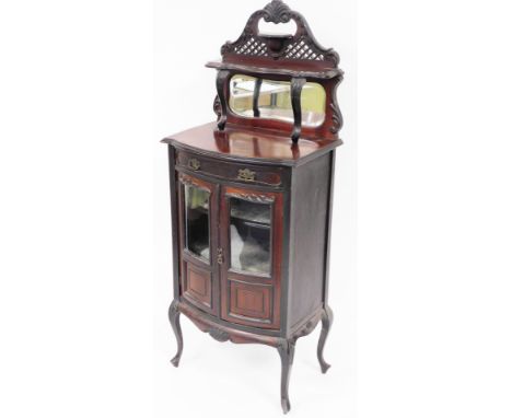 A late Victorian mahogany display cabinet, with shelf and fret work pierced top, with single drawer and two glazed cupboard d