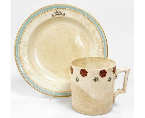 A Belleek earthenware armorial plate, c1870's, black printed first period mark, together with a earthenware tankard (AF), pla