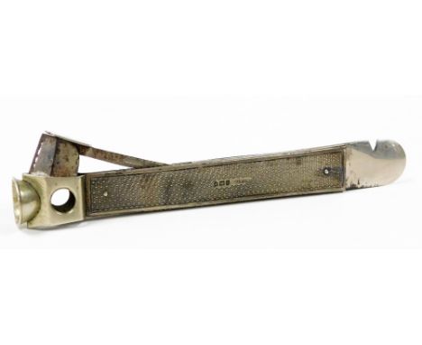 A George V silver and steel cigar cutter, the handle with engine turned decoration, London 1913, 3oz.