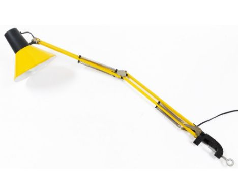 A table mounted angle poise lamp, in yellow, 93cm long.