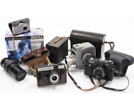 A group of camera equipment, to include a Pentax Optio S5I, Kodak box camera, a Keystone Electric Eye K-4C, a Carina Computer