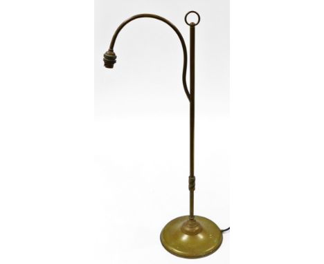 A brass table lamp, with arched pedestal on column support, 70cm high.