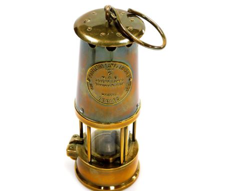 An Eccles miner's lamp, 23cm high.