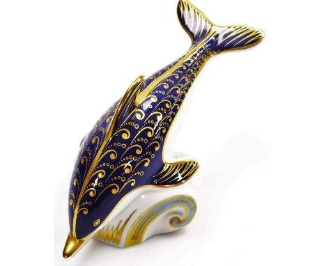 A Royal Crown Derby whale paperweight, with a gold button stopper, 18cm wide. 