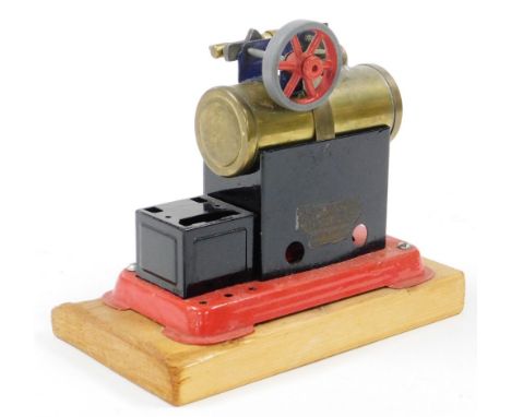 A Mamod mounted steam standing engine, 14cm high.